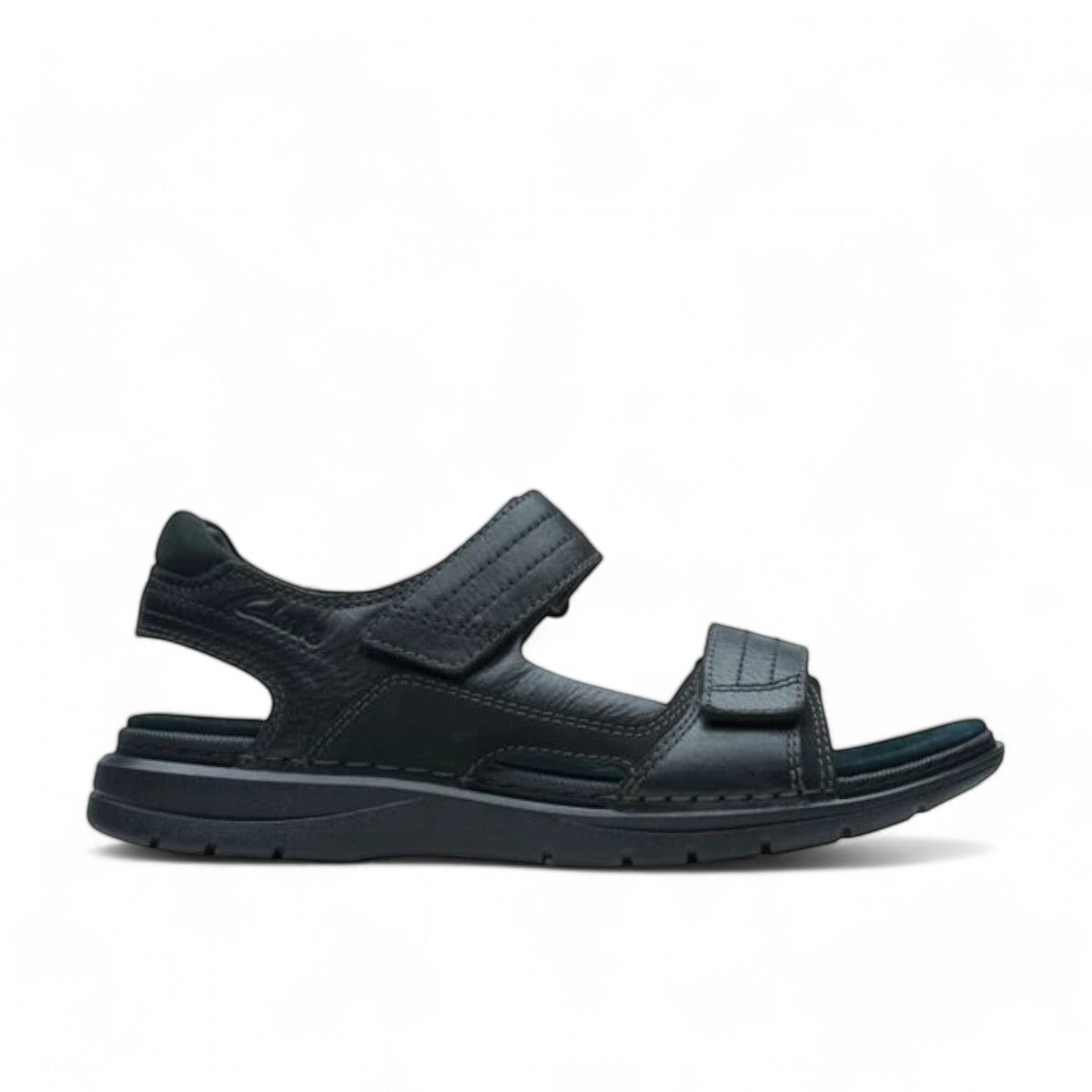 Clarks Nature Trek black nubuck leather sandal with adjustable hook and loop straps and rubber sole.
Photo of the right side.