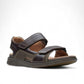 Clarks Nature Trek mahogany leather sandals with adjustable hook and loop straps and ergonomic sole.
photo of the front.