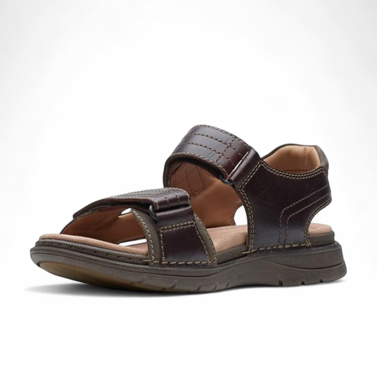 Clarks Nature Trek mahogany leather sandals with adjustable hook and loop straps and ergonomic sole.
photo of the front.