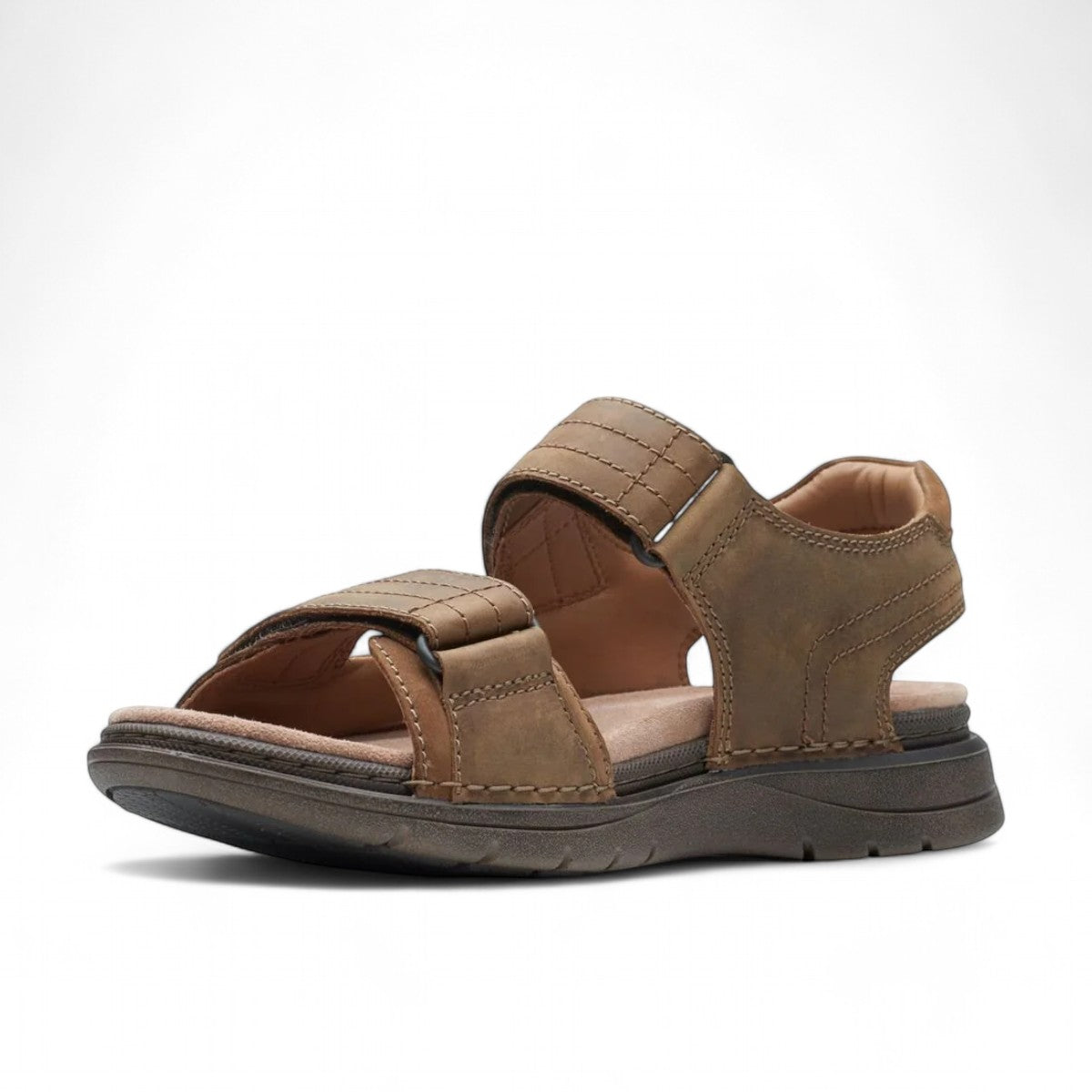 Clarks Nature Trek tan combi nubuck leather sandal with adjustable hook and loop straps.
photo of the front.