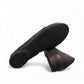 Clarks Rena Way black leather slip-on flat with elasticized topline and flexible rubber sole. bottom view.