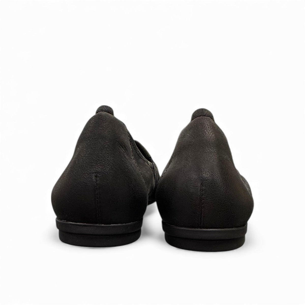 Clarks Rena Way black leather slip-on flat with elasticized topline and flexible rubber sole. back view.