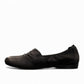 Clarks Rena Way black leather slip-on flat with elasticized topline and flexible rubber sole. left view.