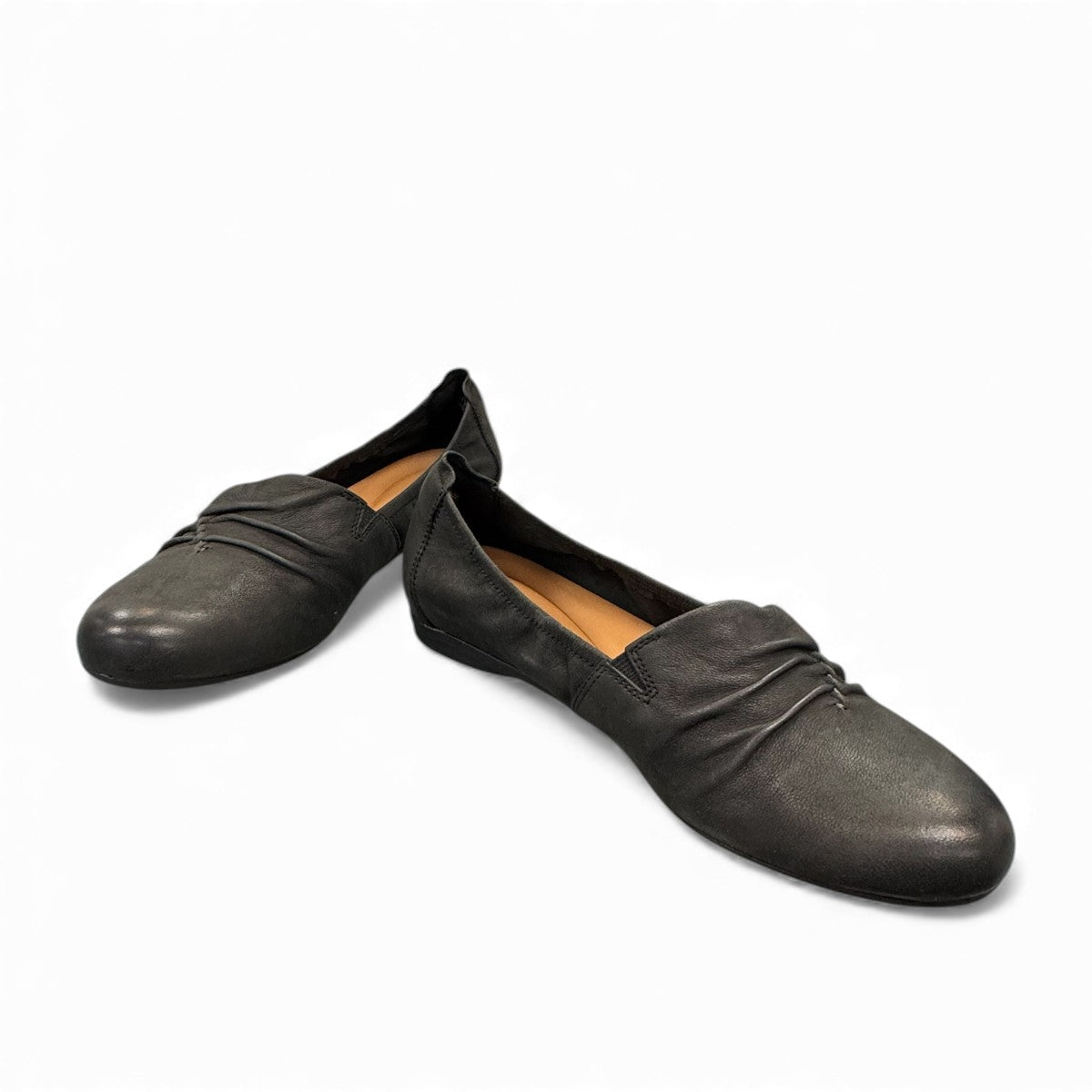Clarks Rena Way black leather slip-on flat with elasticized topline and flexible rubber sole. front view.