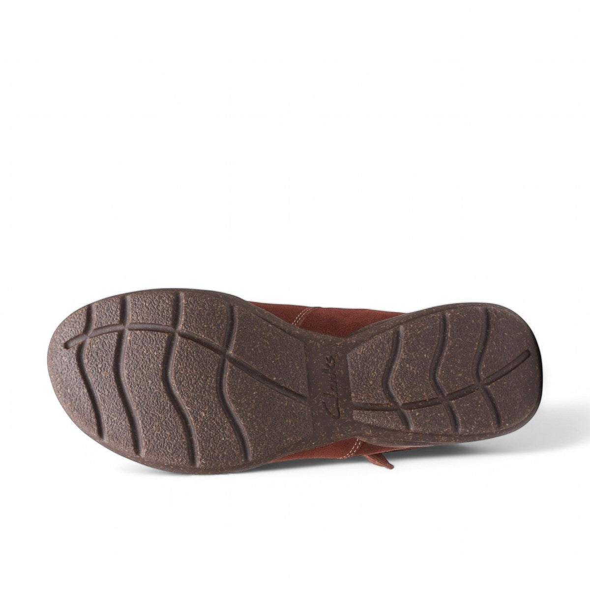 Clarks Roseville mahogany suede ankle boot with faux fur lining, adjustable strap, and textured sole. 
photo of the bottom.