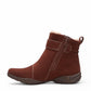 Clarks Roseville mahogany suede ankle boot with faux fur lining, adjustable strap, and textured sole. 
photo of the left.
