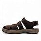 Clarks Saltway Cove fisherman sandal in dark brown leather with triple strap riptape closure. photo of the left.