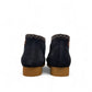 Sina Footwear Clarks Shacre blue leather boots, back view showing textured rubber soles and stitched collar detail. Photo of the back.