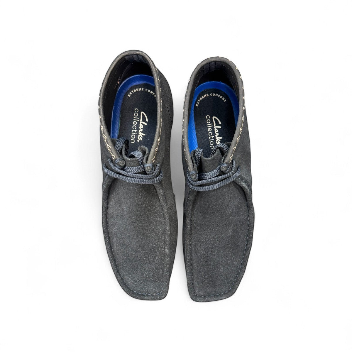Sina Footwear Clarks Shacre blue leather lace-up boots with Wallabee design and padded insoles, top-down view. Photo from above.
