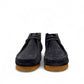 Sina Footwear blue leather Shacre boots with a classic Wallabee design, round toe, lace-up vamp, and rubber sole. Photo of the front.