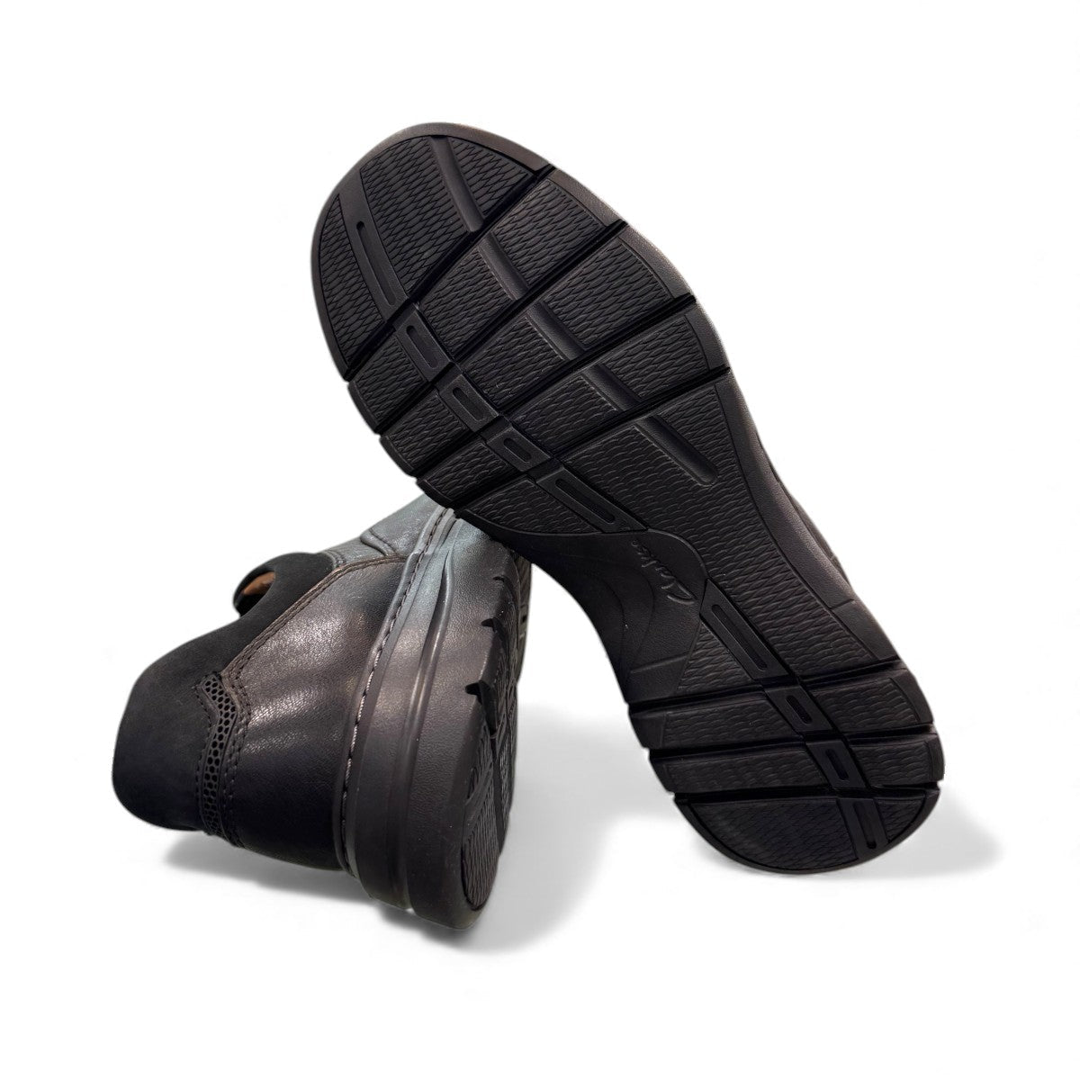 Clarks Un Brawley Lace black leather casual shoe with stitch detailing and a flexible sole. bottom view.