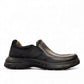 Clarks Un Brawley Step black leather slip-on shoe with textured rubber sole and stitched construction. photo of the right side.