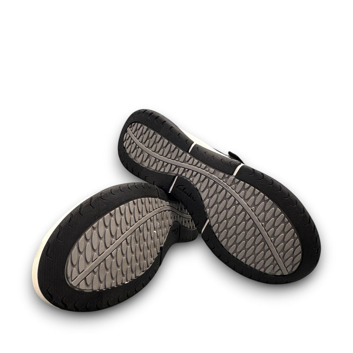 Clarks Wave 2.0 Sea black nubuck thong sandal with curved WaveWalk sole and cushioned footbed. photo of the bottom.