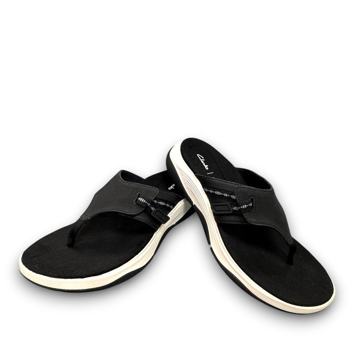 Clarks Wave 2.0 Sea black nubuck thong sandal with curved WaveWalk sole and cushioned footbed. photo of the front.