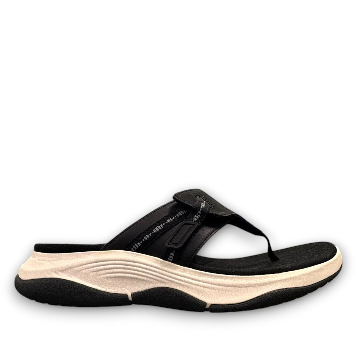Clarks Wave 2.0 Sea black nubuck thong sandal with curved WaveWalk sole and cushioned footbed. photo of the right side.