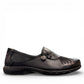 COBB HILL Paulette black leather slip-on shoe with asymmetrical ruching and antique metal button detail. Photo of right side view.
