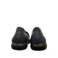 Cobb Hill Paulette navy leather slip-on shoe with asymmetrical lining and antique metal button detail. Photo of back view.