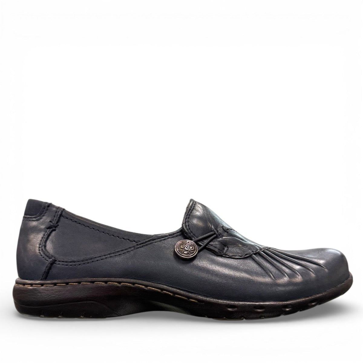 Cobb Hill Paulette navy leather slip-on shoe with asymmetrical lining and antique metal button detail. Photo of right side view.