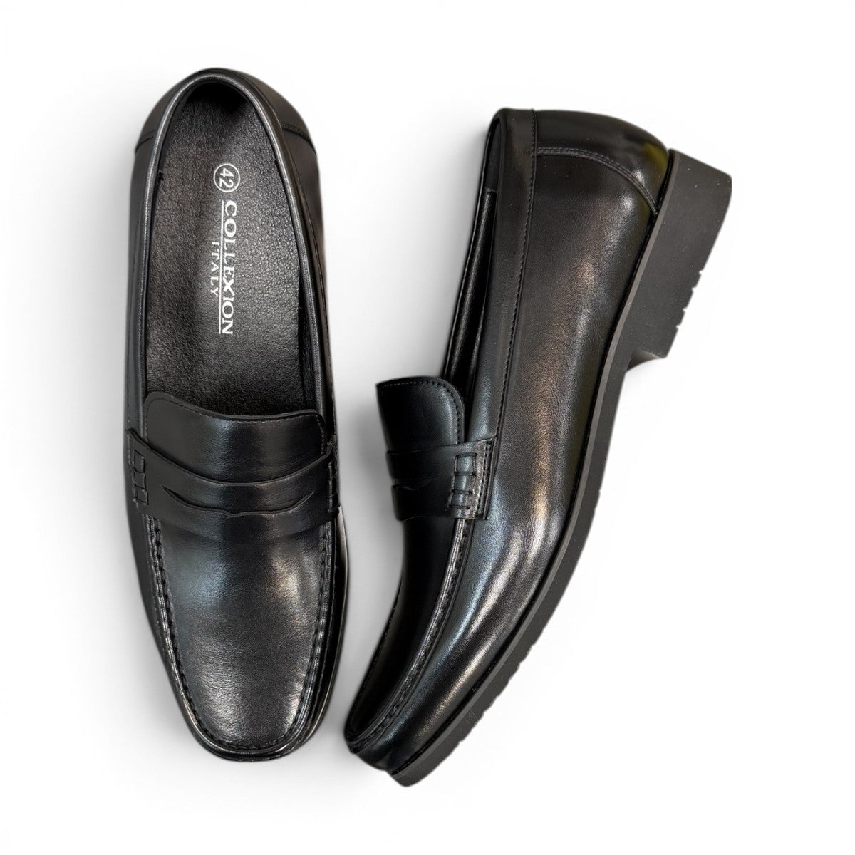 collexion-f7067m black leather penny loafer with a classic slip-on design for professional and smart-casual wear.
photo of the top side
