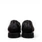 collexion-f7067m black leather penny loafer with a classic slip-on design for professional and smart-casual wear.
photo of the back side
