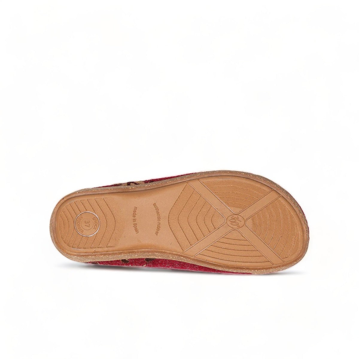 Taos Woolderness 2 cranberry wool clog with floral embroidery, faux fur lining, and cork midsole. Photo of bottom view.