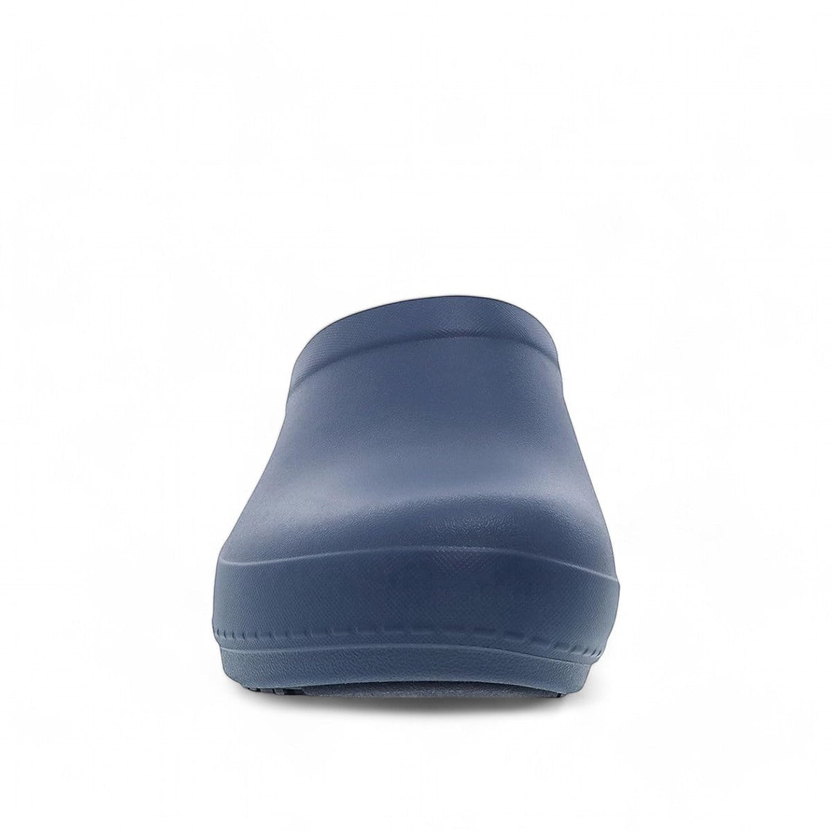 Dansko Kaci blue molded EVA clog seen from the back, showing the slip-resistant rubber outsole. Photo of front view.