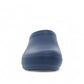 Dansko Kaci blue molded EVA clog seen from the back, showing the slip-resistant rubber outsole.