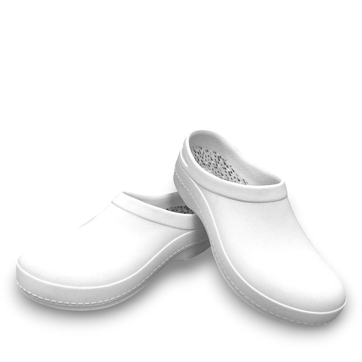 Dansko Kaci white molded EVA clogs showing the slip-resistant rubber outsole and arch support design. Photo of front view.