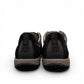 Dansko Paisley black waterproof suede outdoor shoes, slip resistant,  showing durable Vibram rubber outsoles. Photo of back view.
