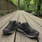 Dansko Paisley black waterproof suede outdoor shoes, slip resistant, showing durable Vibram rubber outsoles. Photo of front view.