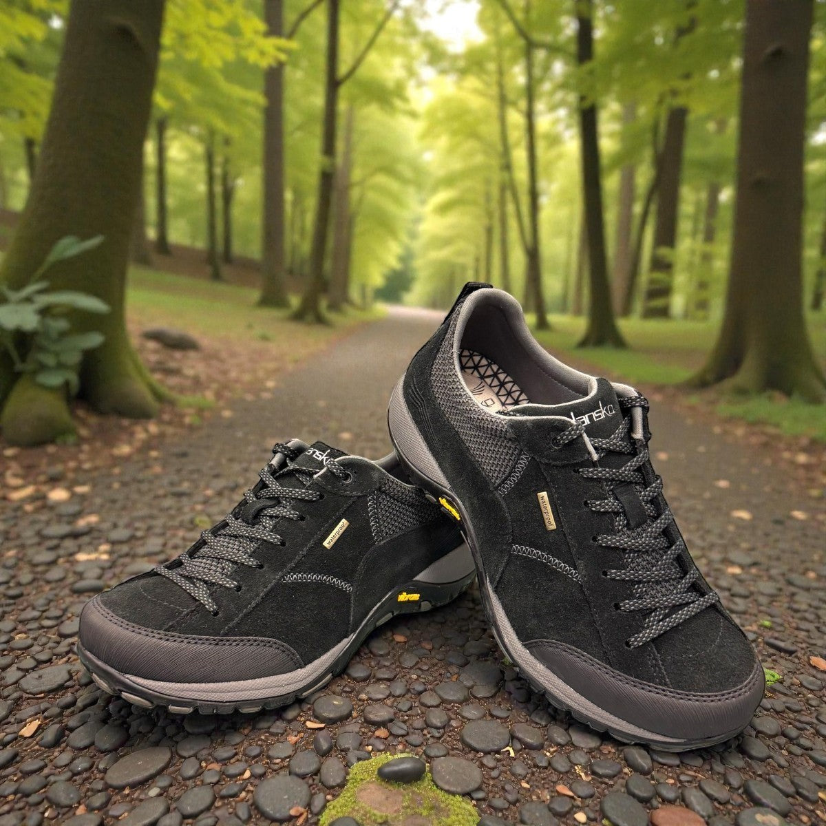 Dansko Paisley black waterproof suede outdoor shoes, slip resistant, showing durable Vibram rubber outsoles. Photo of upper view.