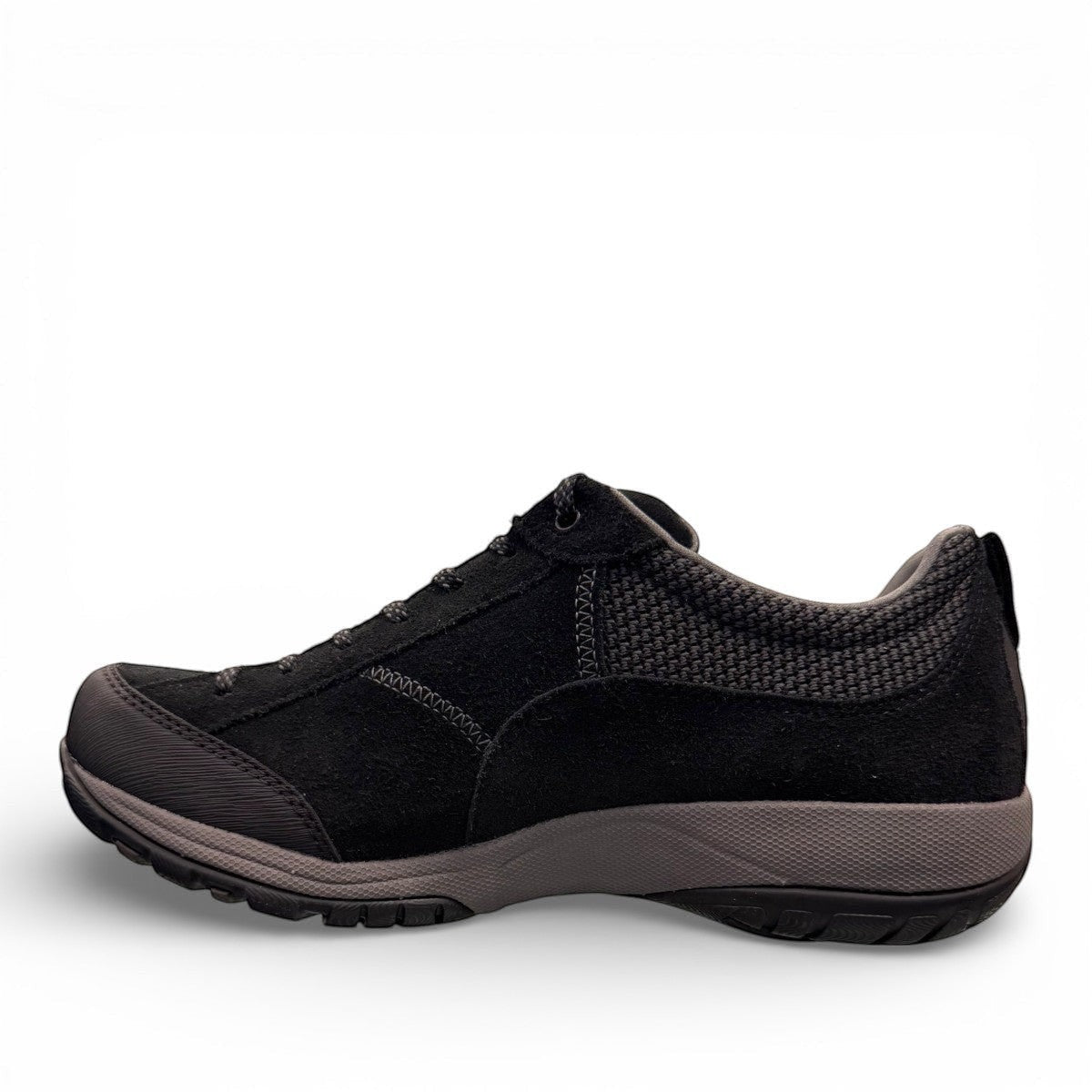 Dansko Paisley black waterproof suede outdoor shoes, slip resistant, showing durable Vibram rubber outsoles. Photo of outside side view.