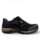 Dansko Paisley black waterproof suede outdoor shoes, slip resistant, showing durable Vibram rubber outsoles. Photo of inside side view.