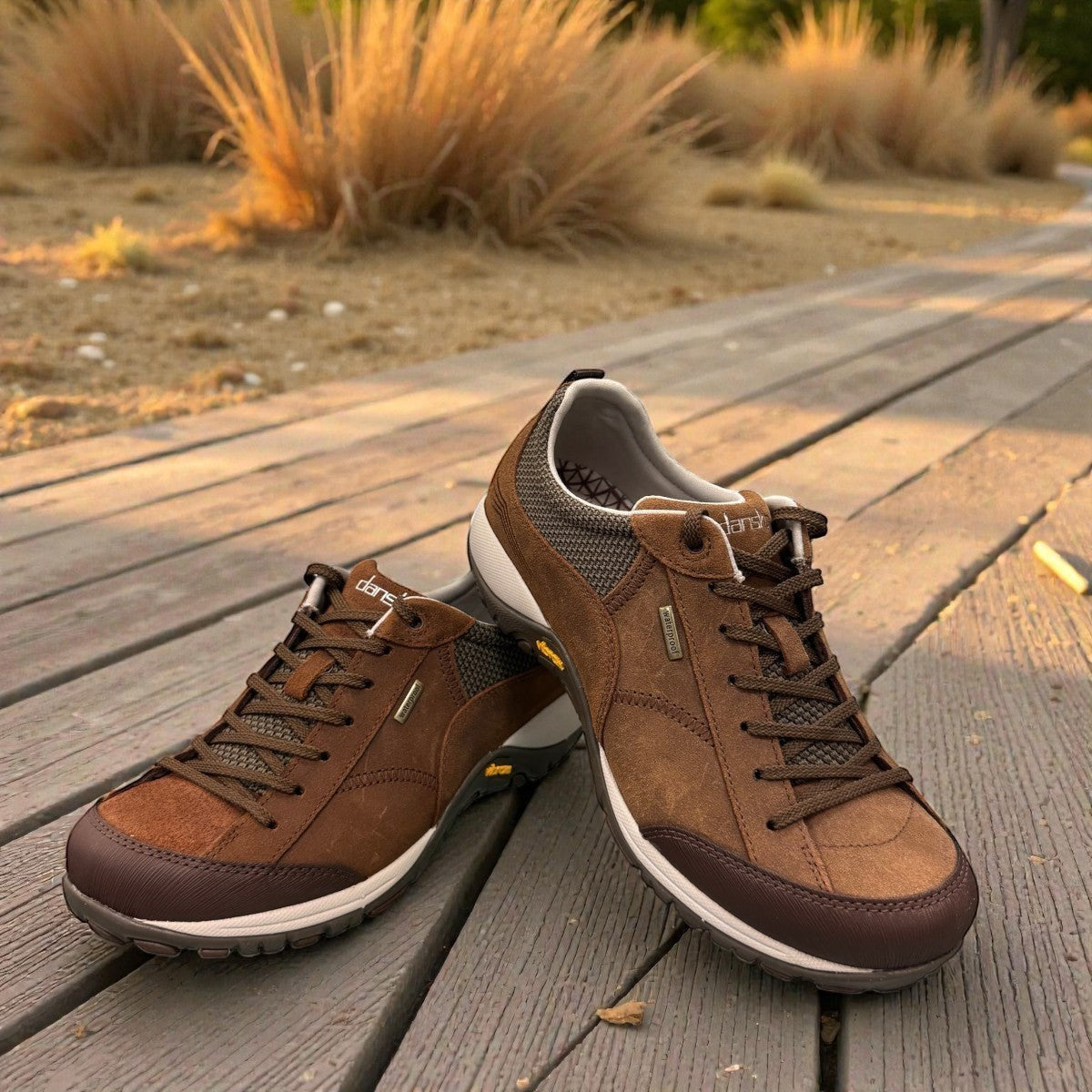 Dansko Paisley brown burnished suede outdoor shoes showing the slip-resistant Vibram rubber outsoles. Photo of upper view.