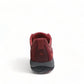 Dansko Paisley red burnished suede outdoor shoe showing the durable slip-resistant Vibram rubber outsole. Photo of back view.