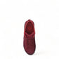 Dansko Paisley red burnished suede outdoor shoe showing the durable slip-resistant Vibram rubber outsole. Photo of vertical upper view.