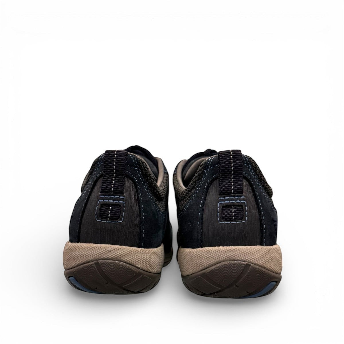 Dansko Paisley navy milled suede outdoor shoes showing the durable slip-resistant Vibram rubber outsoles. Photo of the back view.
