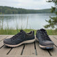 Dansko Paisley navy milled suede outdoor shoes showing the durable slip-resistant Vibram rubber outsoles. Photo of inside angle.