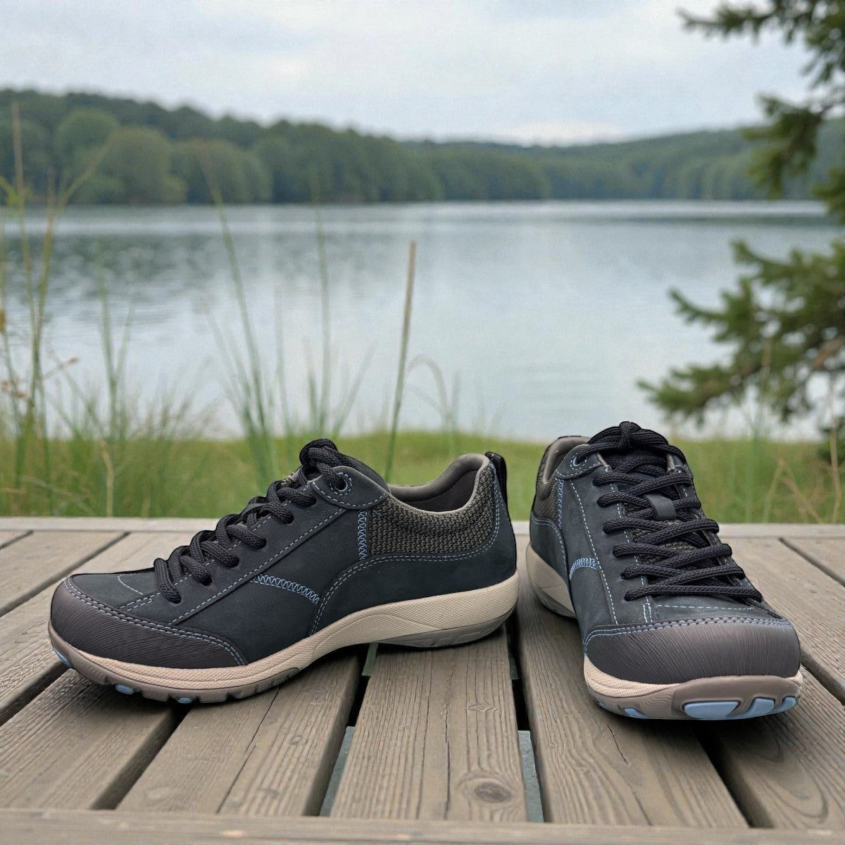 Dansko Paisley navy milled suede outdoor shoes showing the durable slip-resistant Vibram rubber outsoles. Photo of inside angle.