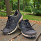 Dansko Paisley navy milled suede outdoor shoes showing the durable slip-resistant Vibram rubber outsoles. Photo of the front.