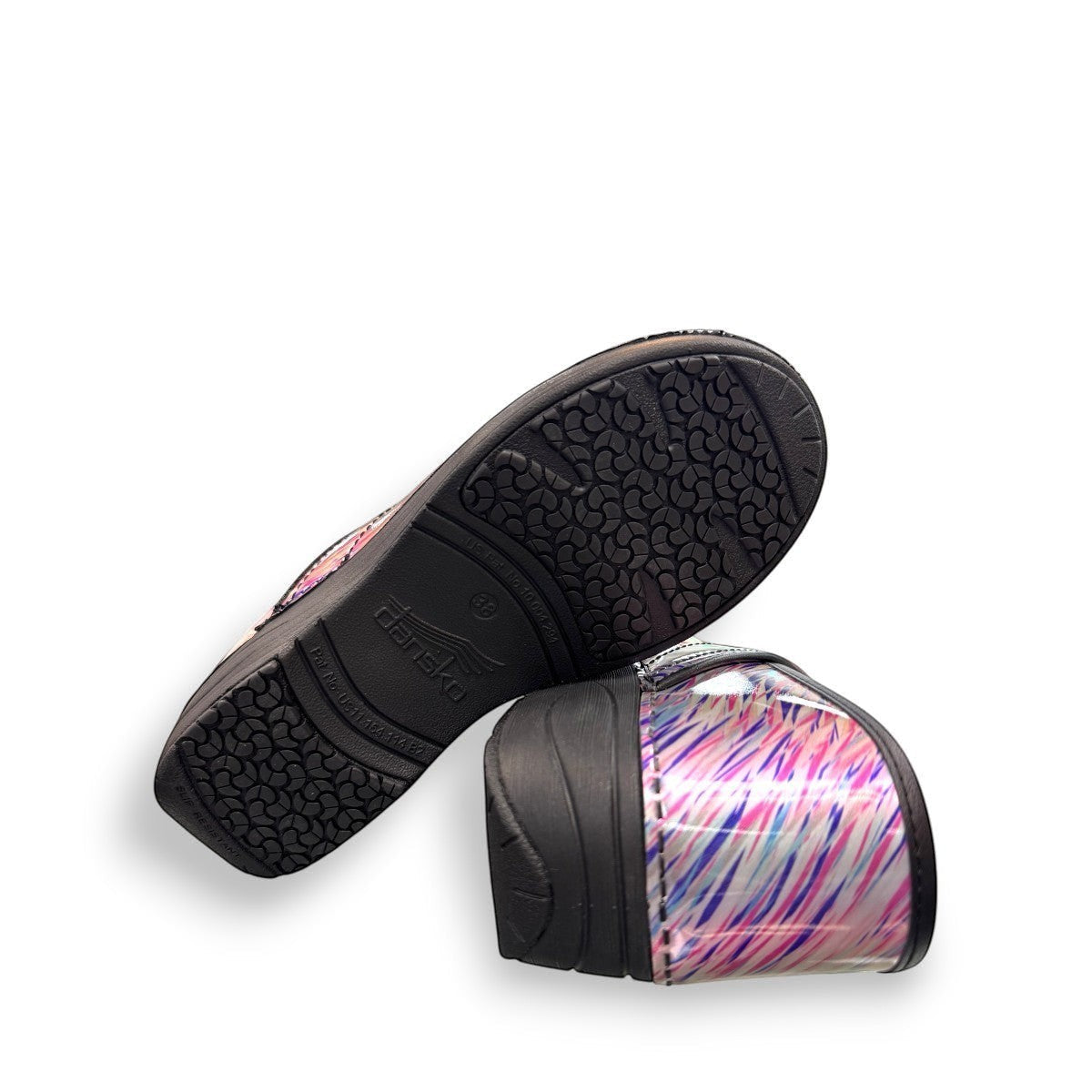 Dansko XP 2.0 patent clogs in pastel blur print showing the slip-resistant rubber outsole. Photo of bottom view.