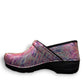 Dansko XP 2.0 patent leather performance clog in a pastel blur multi-color print with black sole. Photo of outside left side view.
