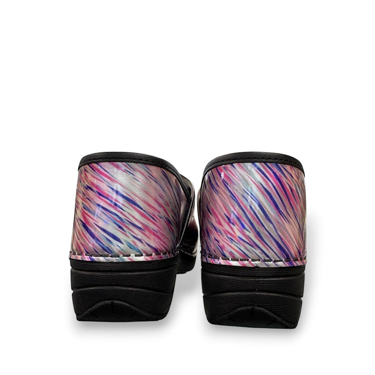 Dansko XP 2.0 patent clogs in pastel blur print with slip-resistant black soles. Photo of back view.