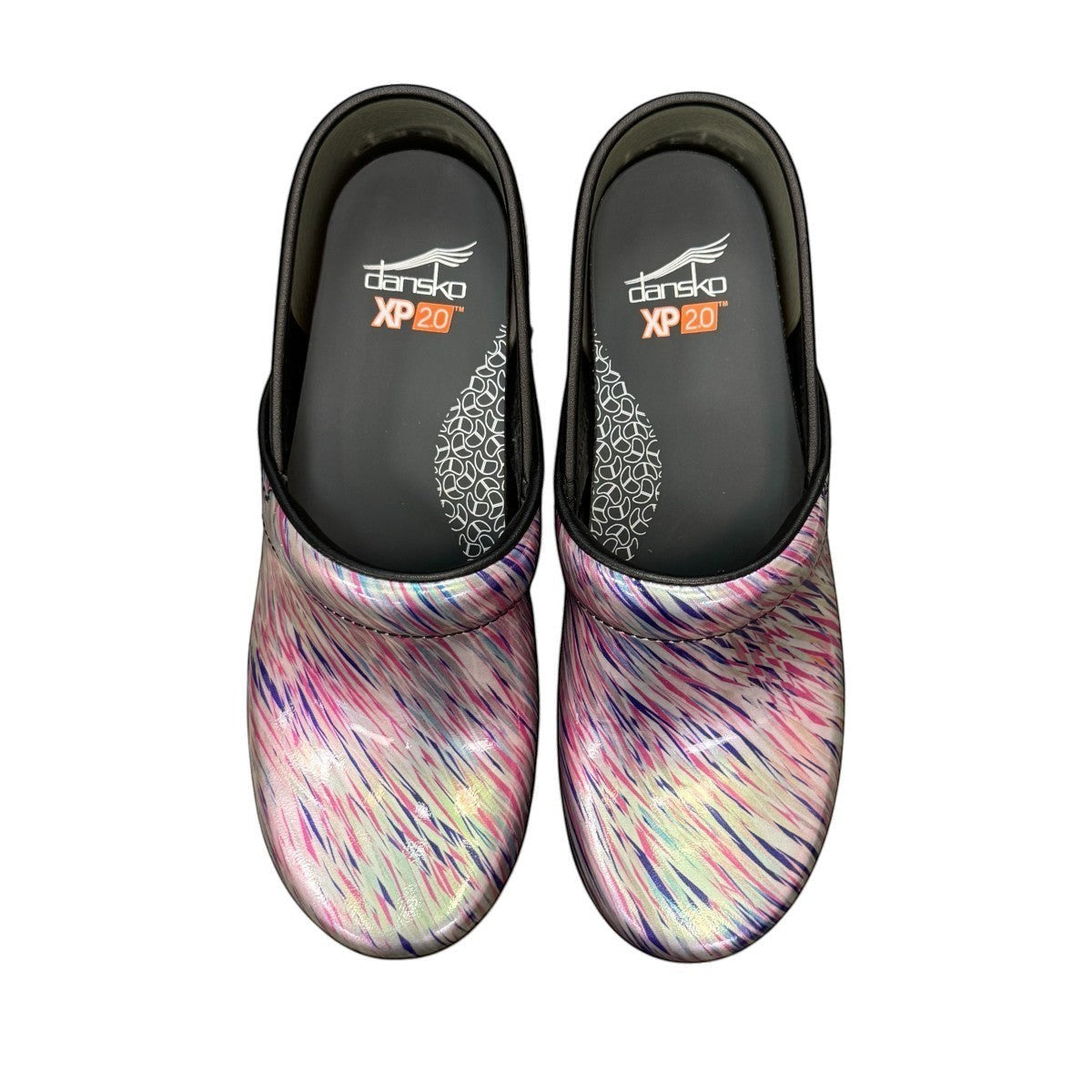 Dansko XP 2.0 patent clogs in pastel blur print with slip-resistant soles for healthcare professionals. Photo of upper view.