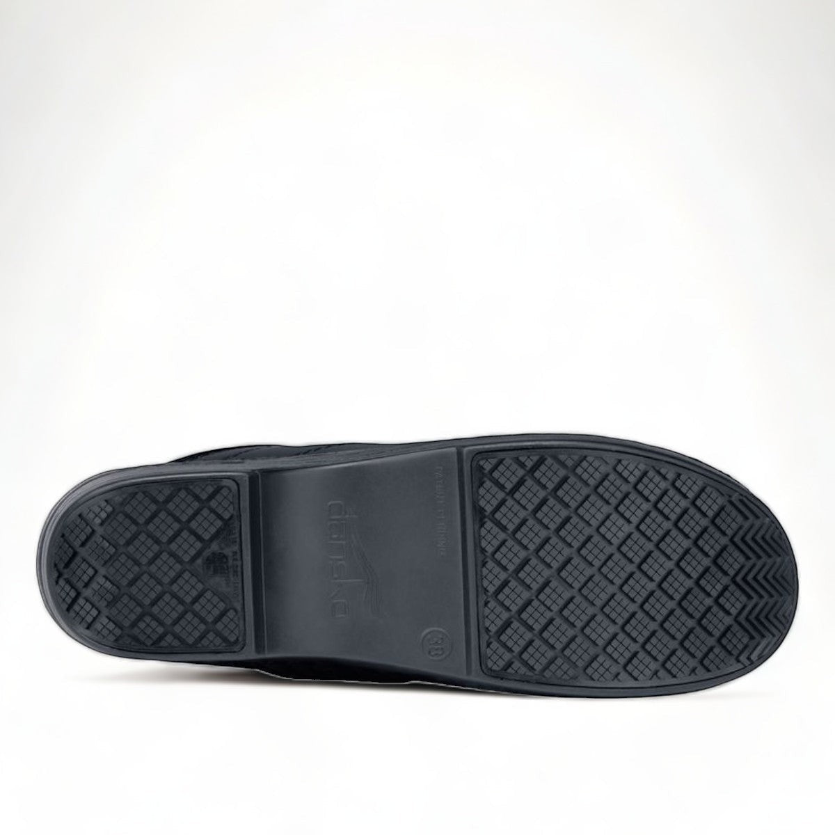 Dansko Pro XP black leather slip-resistant professional clog with rocker bottom and padded collar. Photo of bottom view.