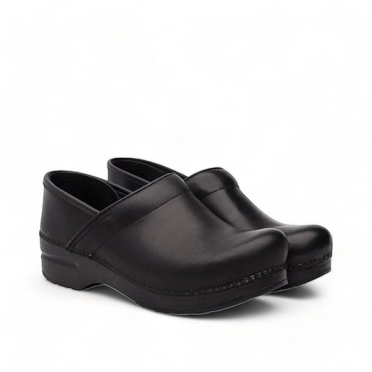 Dansko Pro XP black leather slip-resistant professional clog with rocker bottom and padded collar. Photo of side view.