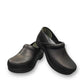 Dansko XP 2.0 black waterproof leather performance clog showing the slip-resistant rubber outsole