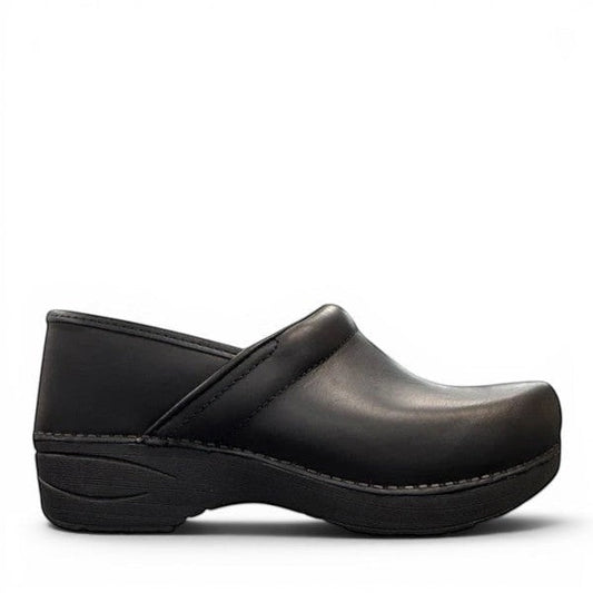 Dansko XP 2.0 black waterproof leather performance clog showing the slip-resistant rubber outsole. Photo of right side view.