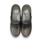 Dansko XP 2.0 black waterproof leather performance clog showing the slip-resistant rubber outsole