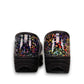 Dansko XP 2.0 patent clog in black with a colorful confetti-like pattern and slip-resistant sole.